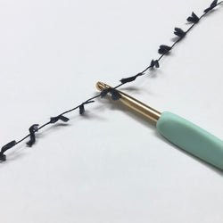 もったいない糸:1031　   ナイロンスラリットモール　約150g(750m）